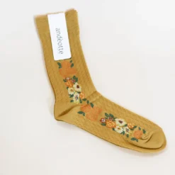andéotte knæstrømper - Gule med orange blomster