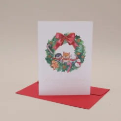 Julekort og kuvert med shibaer i adventskrans