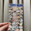 Klistermærker: Sushi med gulddetaljer